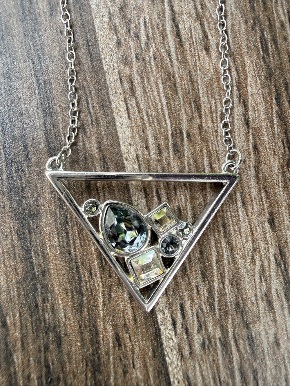 Touchstone Crystal Silver Triangle Pendant with Iridescent and Gray Stones